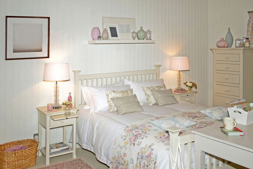 Big white bed in light bed room